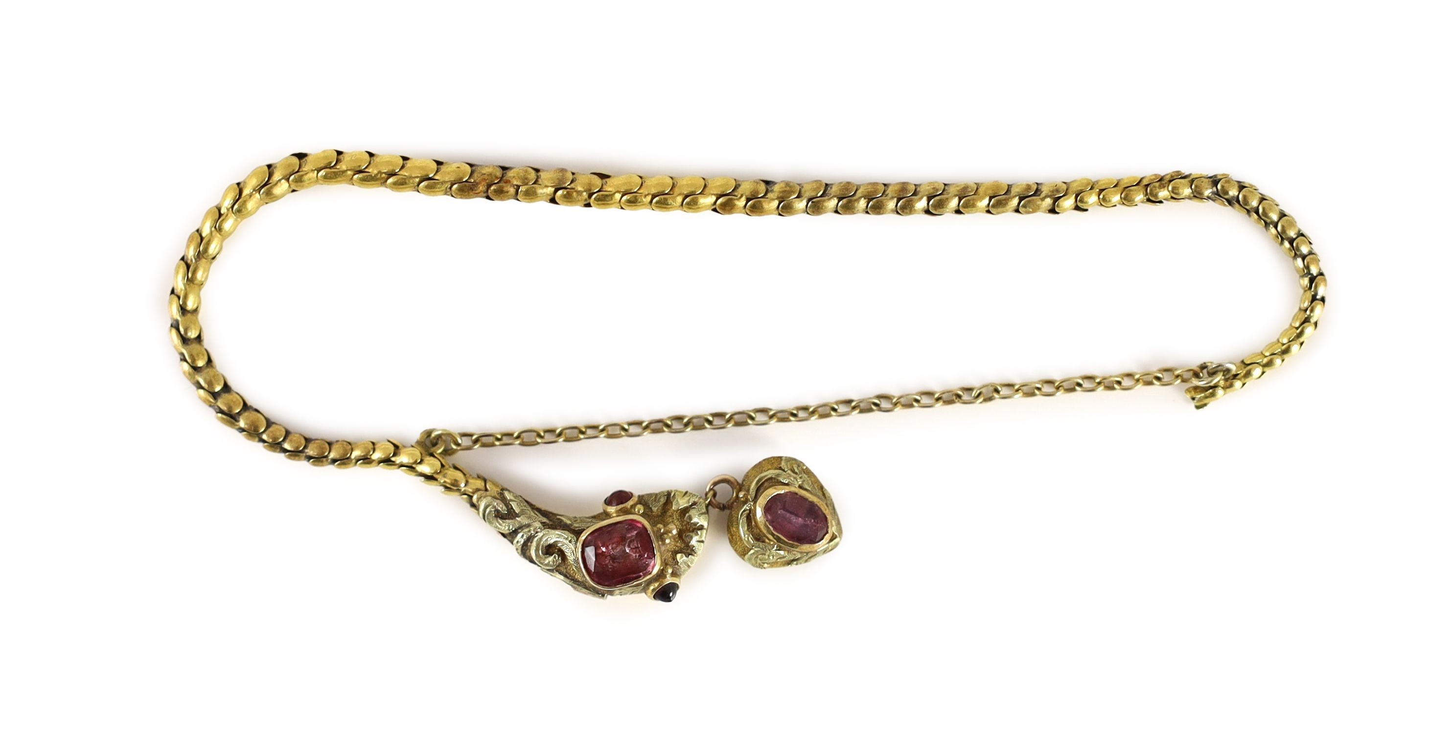 An early 19th century two colour gold and foil backed pink gem set serpent head and snake link bracelet